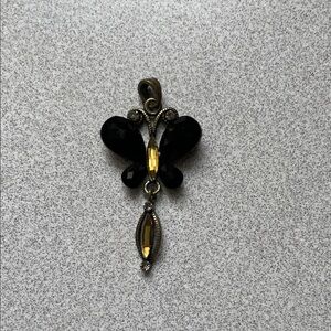 Elegant Black and Gold Butterfly Pendant